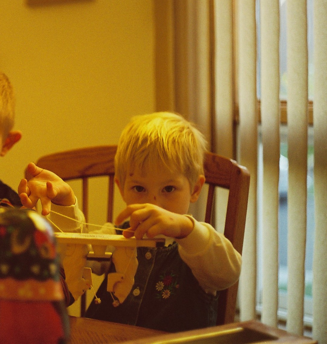 Even as a baby I was fascinated by how things worked, here a wood & string kinetic toy.